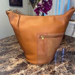 Universal thread shoulder bag